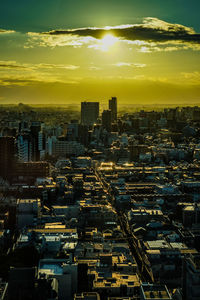 High angle view of cityscape against sky during sunset