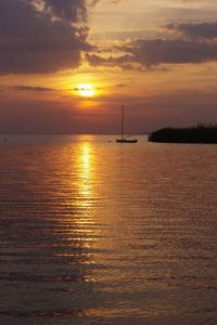 View of calm sea at sunset