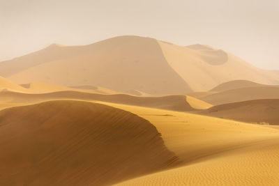 Scenic view of desert against sky