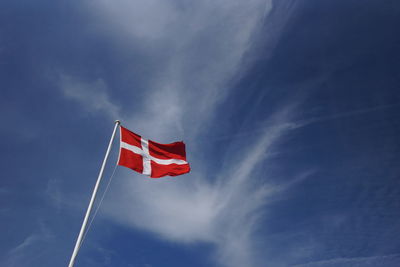 Low angle view of flag against sky