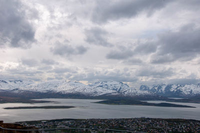 Scenic view of snowcapped mountains against sky