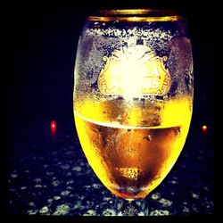 Close-up of wine glass on table