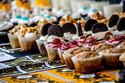 Close-up of cupcakes on display at store