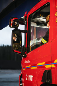 Firefighter driving fire engine