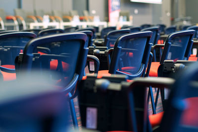 Close-up of empty seats in row