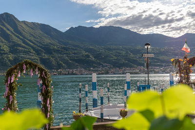 Scenic view of bay against mountains