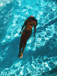 Woman swimming in pool