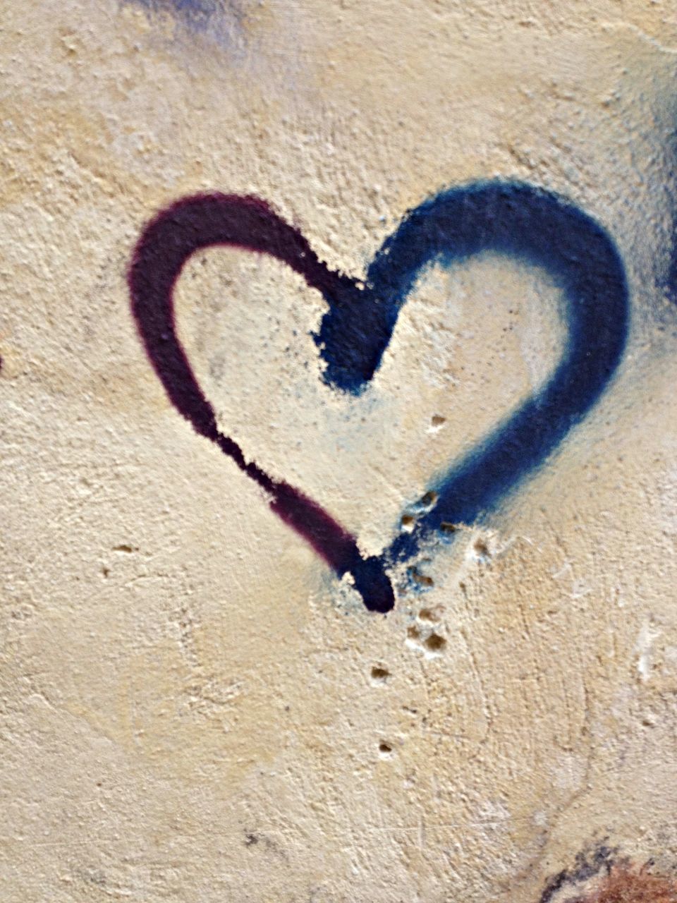 art, creativity, text, art and craft, heart shape, close-up, communication, western script, wall - building feature, human representation, textured, love, graffiti, animal representation, ideas, day, no people, wall, shape, outdoors