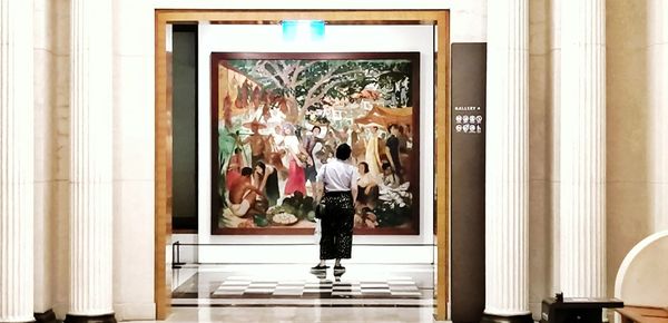 Group of people in glass window