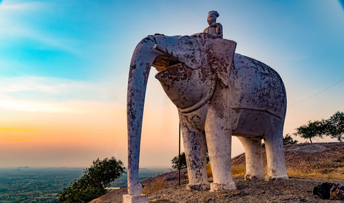 View of elephant statue against sky during sunset