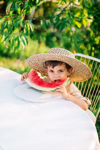 Portrait of cute girl wearing hat
