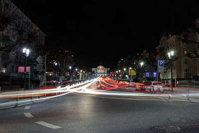 Light trails on city street at night