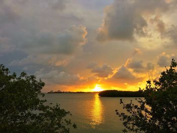 Scenic view of sunset over river