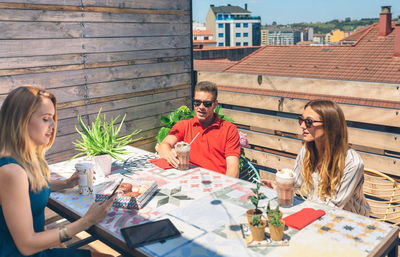 Group of people sitting at table