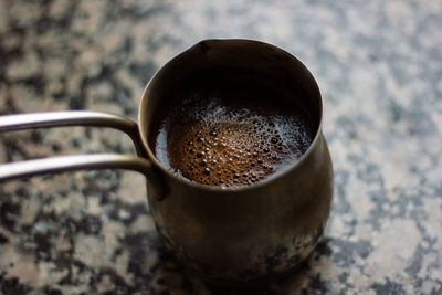 Turkish coffee in turk. coffee pot. delicious drink, recipe. cezve. high quality photo