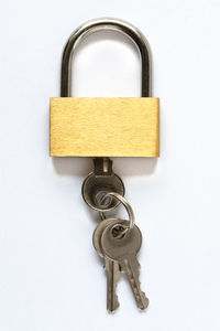 Close-up of padlock on metal