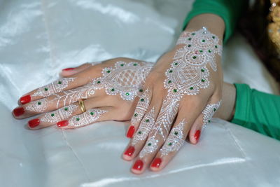 Close-up of hand with heena tattoo