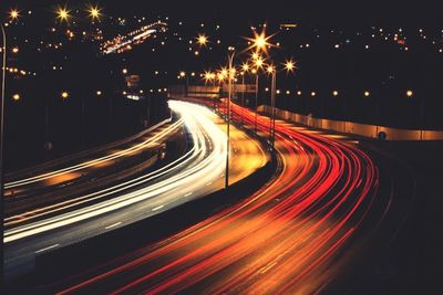 Blurred motion of car on road at night