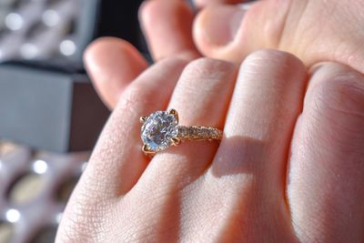 Close-up of woman wearing diamond ring