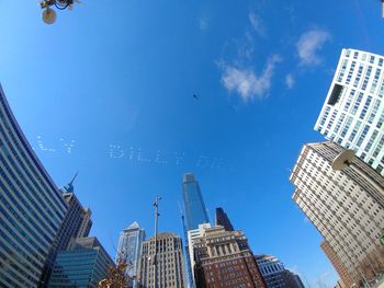 Low angle view of skyscrapers against sky