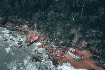 High angle view of people swimming in sea