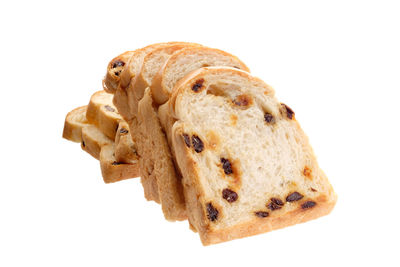 Close-up of cake against white background