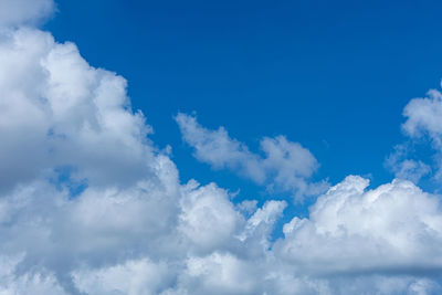 Low angle view of clouds in blue sky