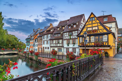 Embankment of lauch river with historical houses in colmar, alsace, france