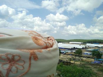 Close-up of hand on beach