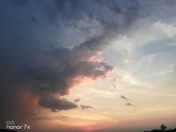 Low angle view of dramatic sky during sunset