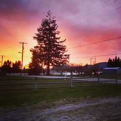 Scenic view of landscape against sky at sunset