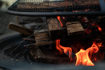 Close-up of fire on barbecue grill