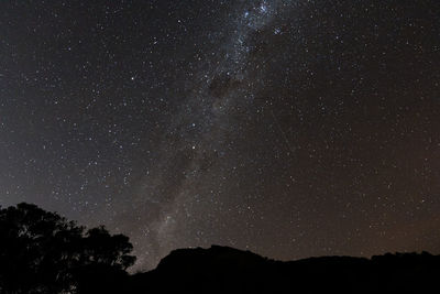 Low angle view of stars against sky at night