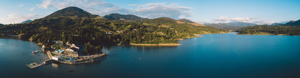 Panoramic view of bay against sky