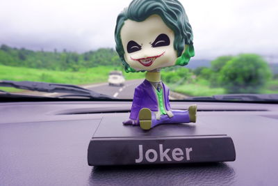 Close-up of mannequin in car