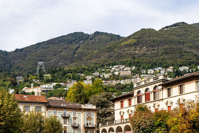 View of the mountains behind locarno with the station of the funicular to madonna del sasso