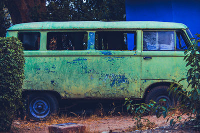 Abandoned car on field