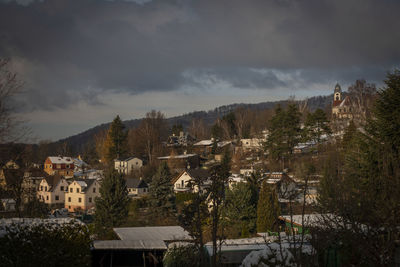 Buildings in city against sky