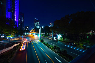 High angle view of illuminated city street at night