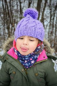 Portrait of cute girl in snow