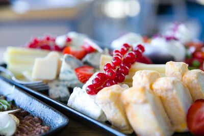 Close-up of fruits in plate on table