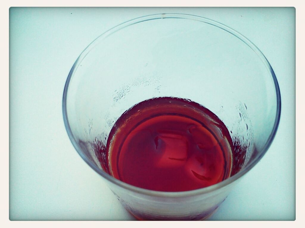 indoors, red, drink, food and drink, refreshment, close-up, still life, glass, freshness, glass - material, drinking glass, auto post production filter, circle, transfer print, directly above, container, blue, transparent, table, no people