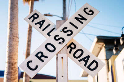 Low angle view of information sign on road