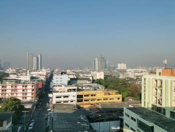 High angle view of buildings against clear sky