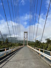 Bridge against sky in city