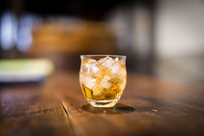 Close-up of beer in glass on table