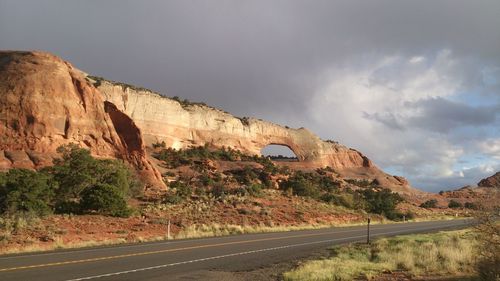 Scenic view of landscape against cloudy sky