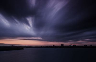 Scenic view of dramatic sky over sea