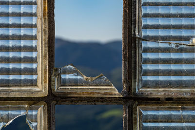 Close-up of broken window