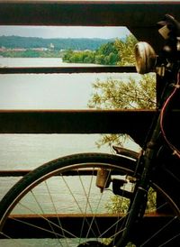 Close-up of bicycle wheel against sky